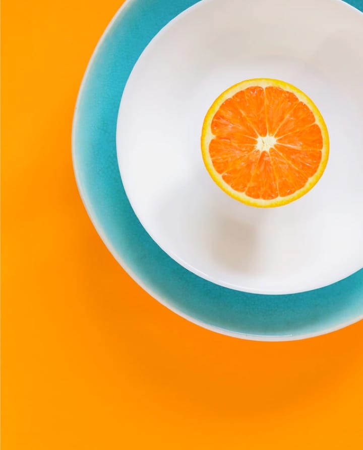 orange on a plate image